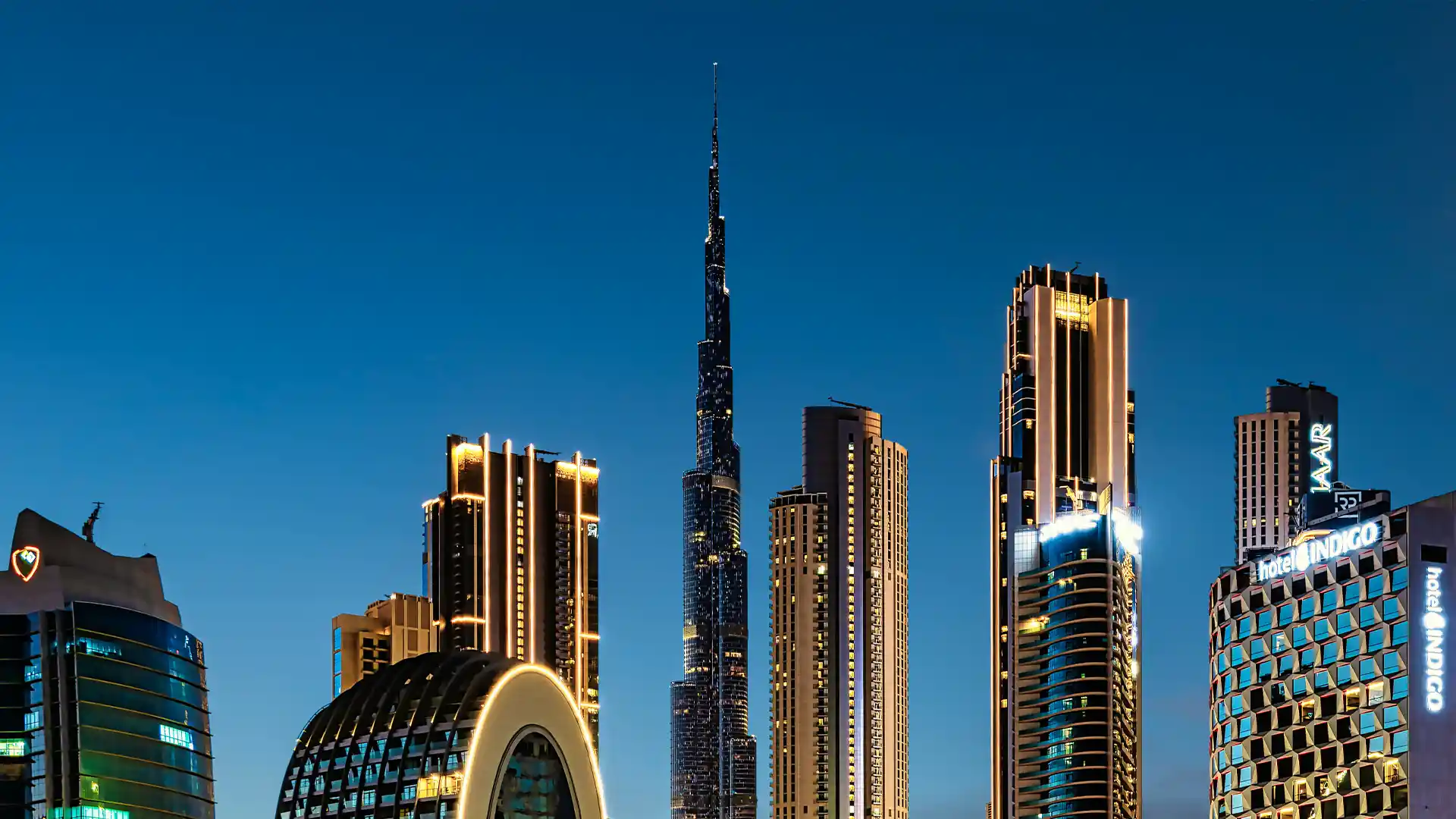 Dubai city skyline with Burj Khalifa and modern skyscrapers at dusk, symbolizing new opportunities for professionals moving to Dubai