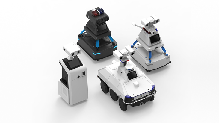 Four autonomous security robots with cameras and sensors on wheels and stationary bases, designed for surveillance and monitoring.