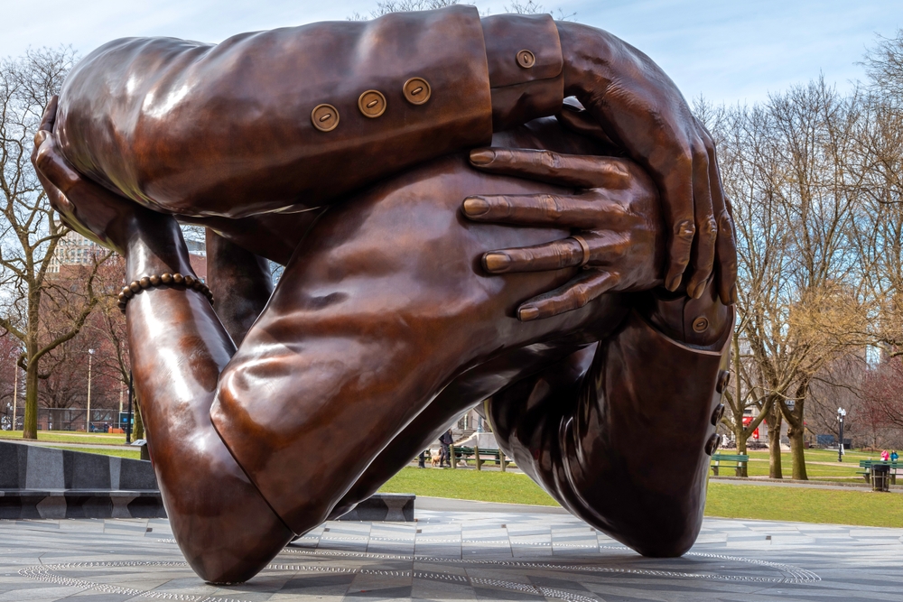 The Embrace, a boston memorial sculpture for Martin Luther King and Loretta Scott King, Four arms embracing in bronze