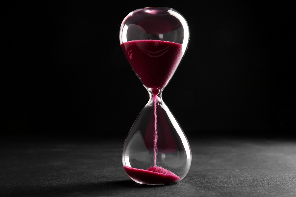 Hourglass with pink sand