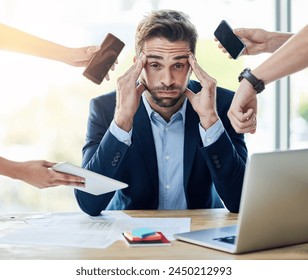 White presenting, male presenting business person looking overwhelmed as hands come from all directions wit phones and paper