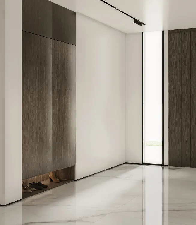 Contemporary space in a private villa with custom cabinetry and marble flooring.