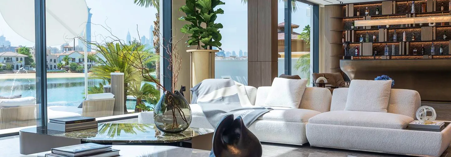 Modern villa design featuring expansive windows and custom aluminum facades