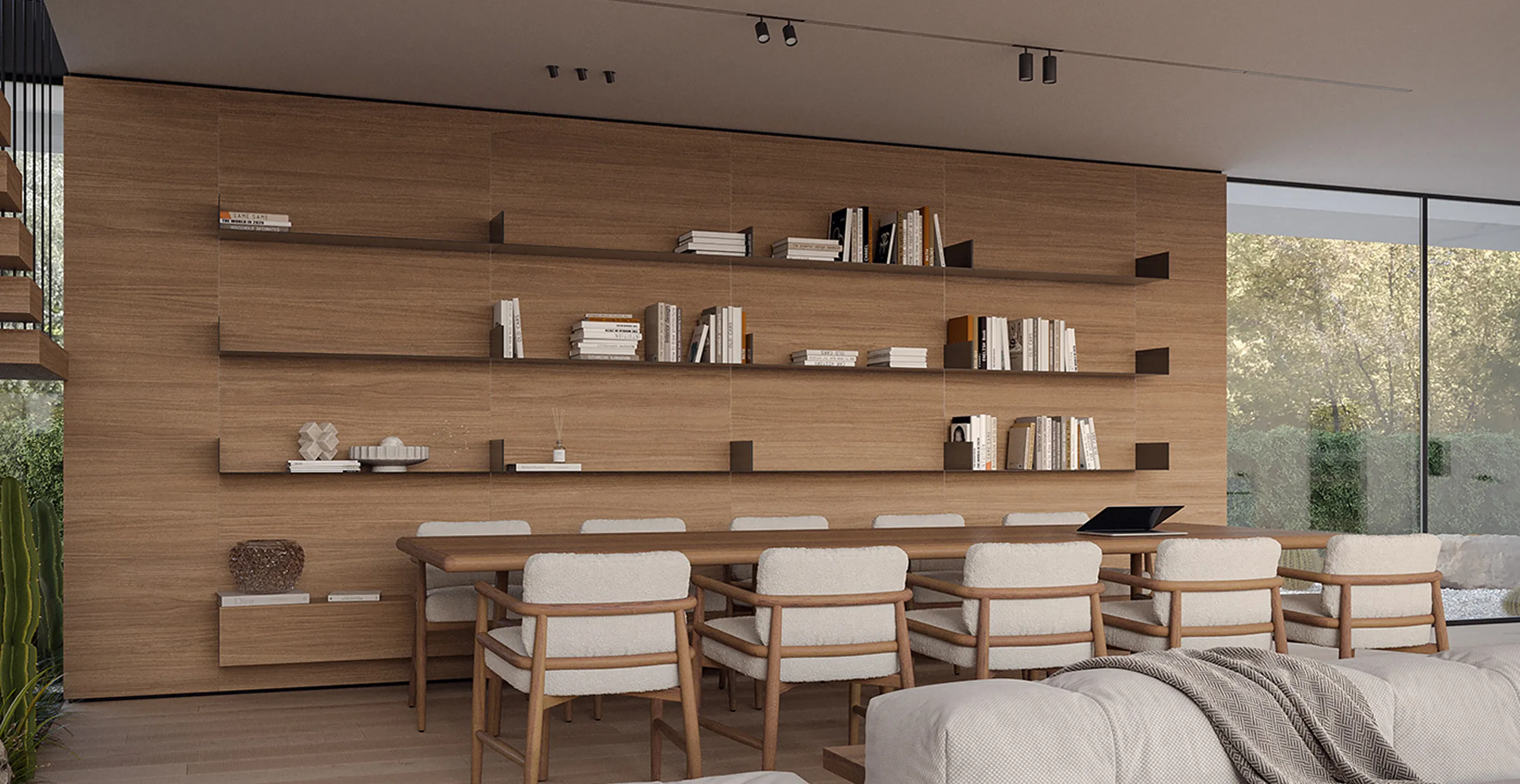 Minimalist living and dining area interior design with wood finishes and built-in shelves in Cape Town.