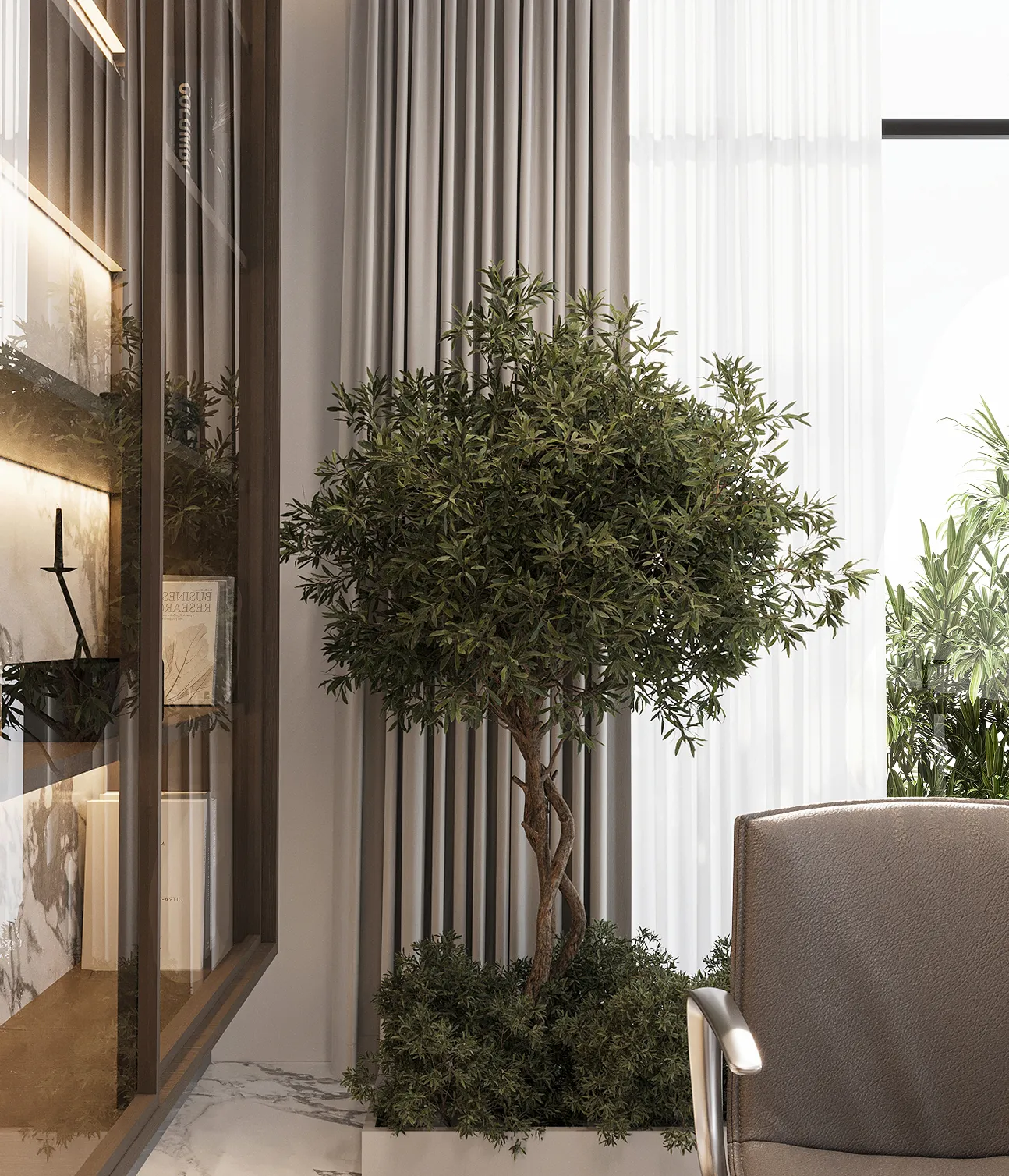 Private villa interior fit-out featuring a large potted olive tree in Kampala.