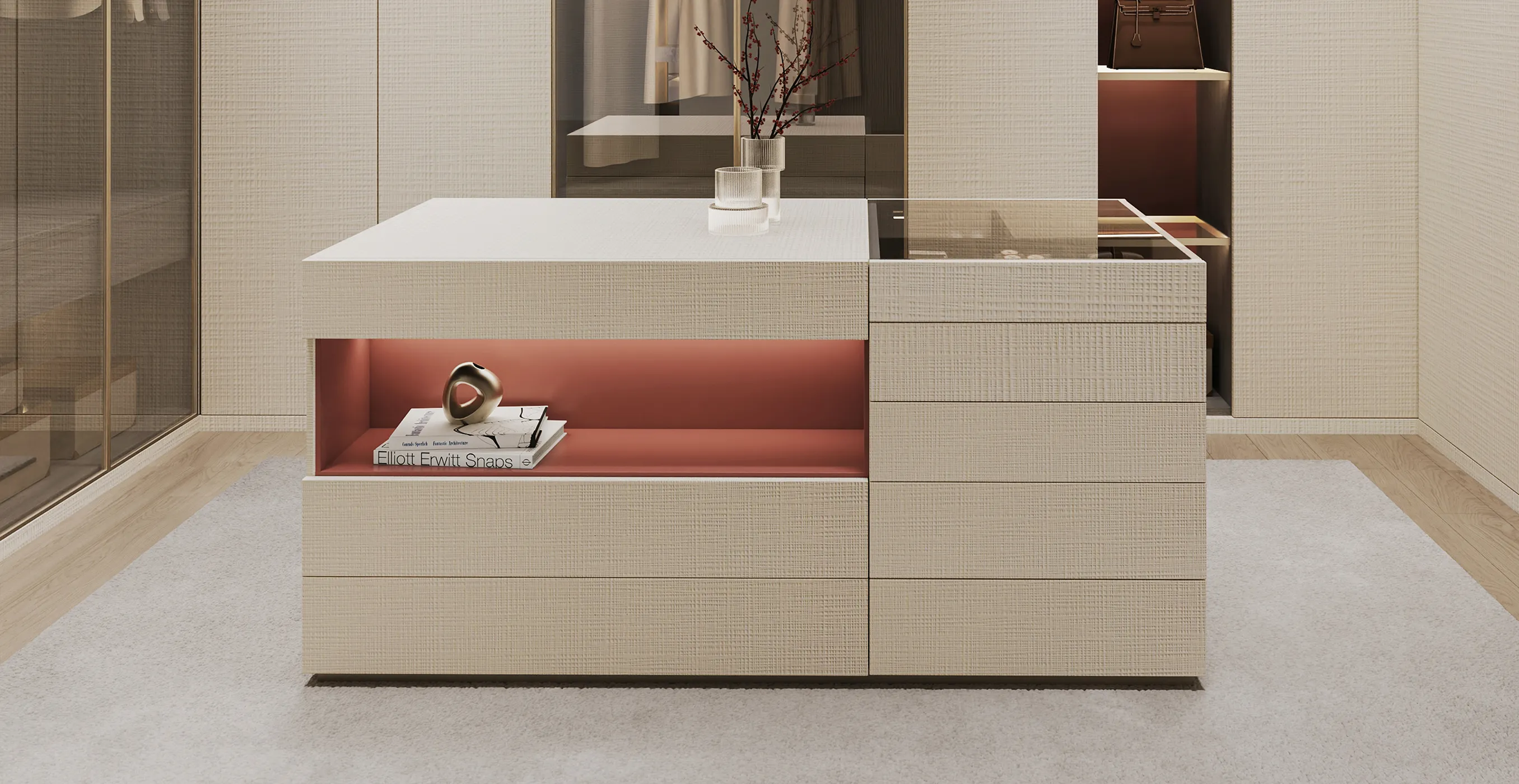 Modern walk-in closet with cabinets, glass sections, and a central island in Kampala.