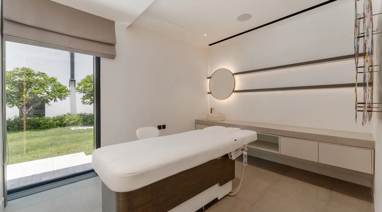 Spa room in a luxury villa featuring minimalist interior design and bespoke finishes.