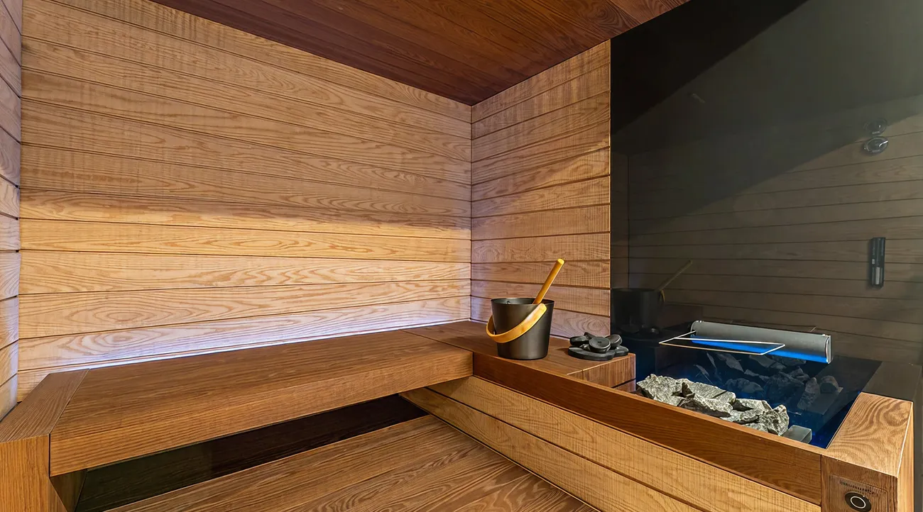 Spa room in a luxury villa featuring minimalist interior design and bespoke finishes.