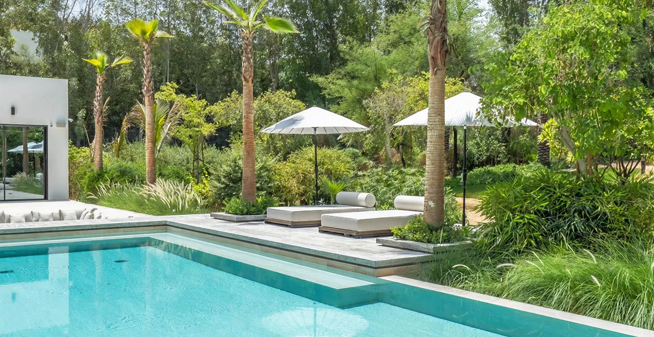 Poolside with a custom-designed lounge area in a luxury villa in Al Barari