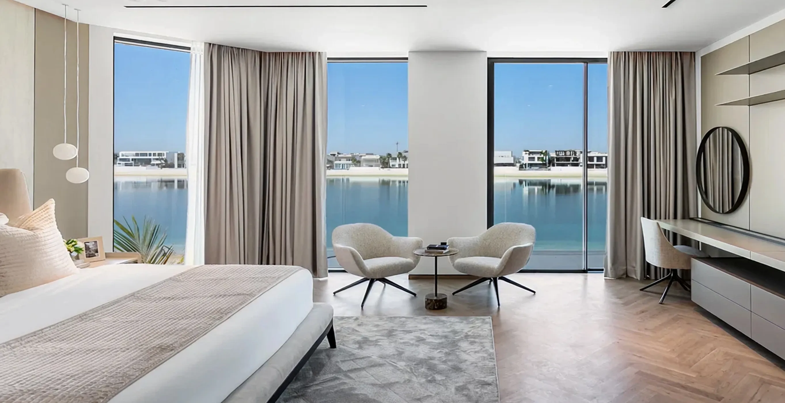 Villa renovation in Palm Jumeirah featuring wooden accents, open layout, and expansive window views.