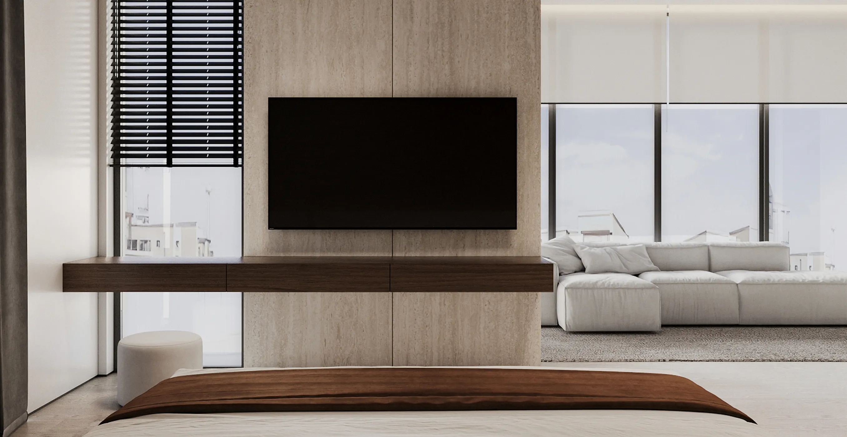 Luxury living area interior design with a mounted TV and modern furnishings.