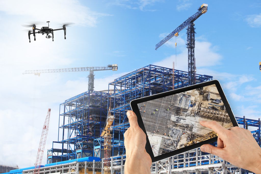 Professional drone technology is utilized for comprehensive monitoring and inspection on a large industrial construction site