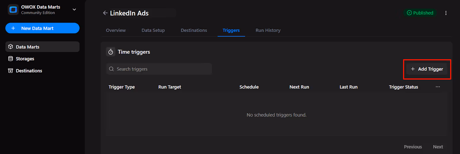 Triggers tab in OWOX Data Marts showing the option to add a new time trigger, with no scheduled triggers currently listed for the LinkedIn Data mart. i-shadow