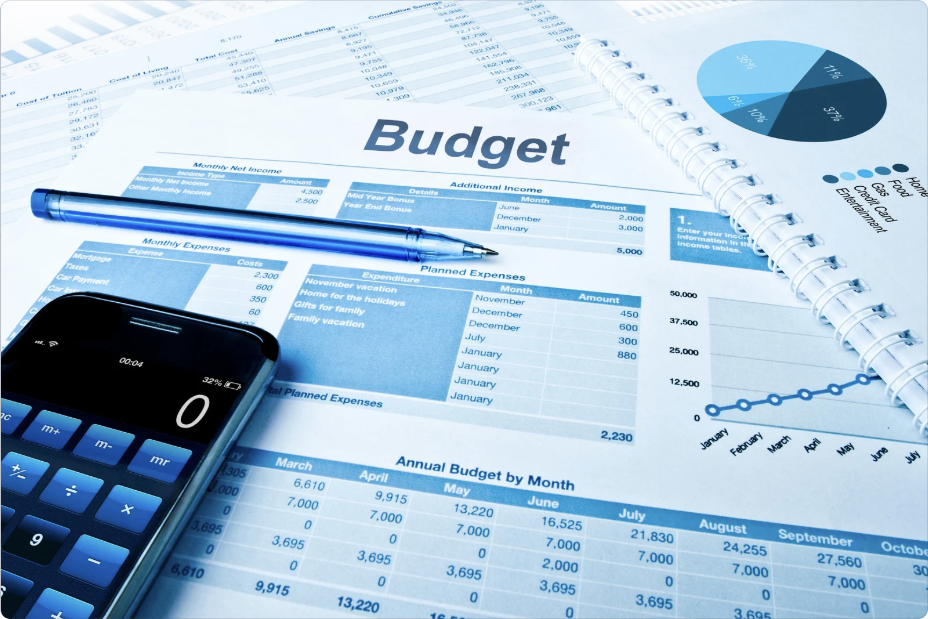Budget spreadsheet with figures and charts used to explain how to track expenses, plan monthly finances, and manage spending. i-radius