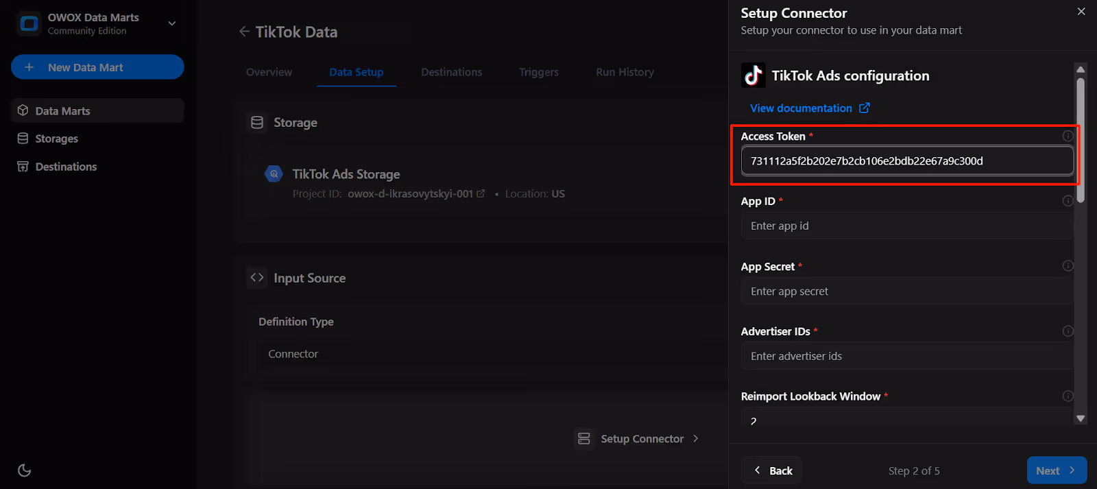OWOX connector configuration panel with the TikTok Ads access token field filled in for authentication. i-shadow