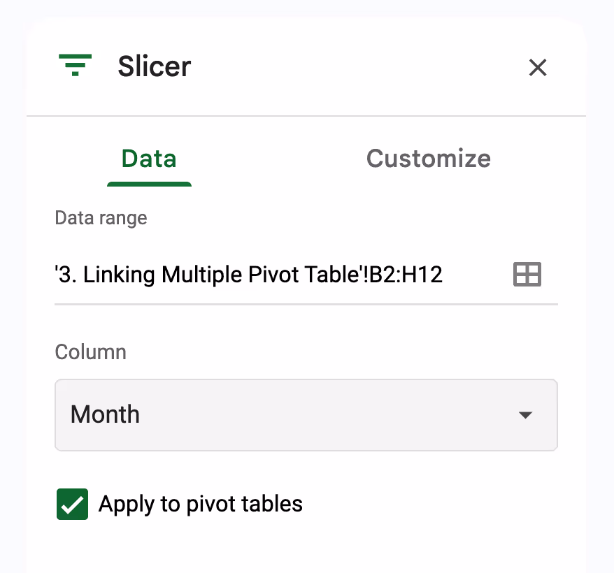 Slicer editor with Month selected as the column and the “Apply to pivot tables” option checked, enabling one-click filtering across multiple pivot tables. i-shadow