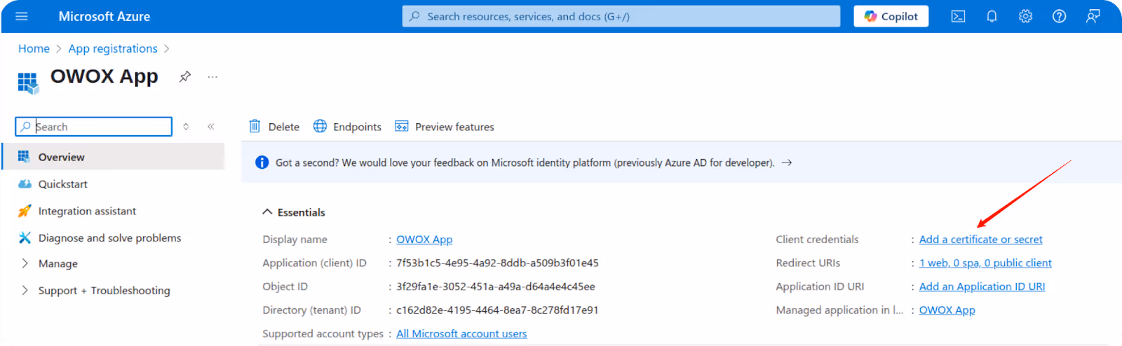 Microsoft Azure App registration page showing OWOX App with an arrow pointing to "Add a certificate or secret" under Client credentials. i-shadow