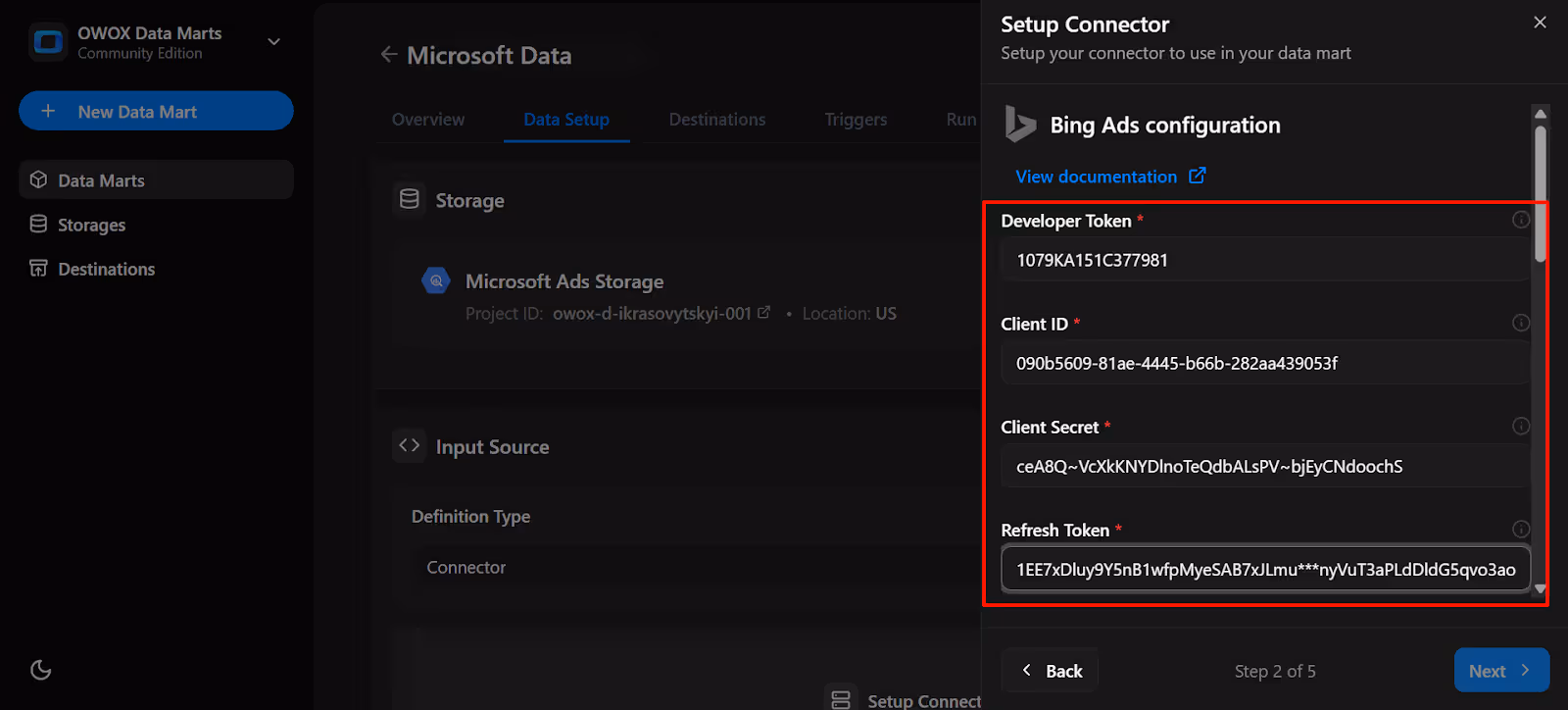 OWOX connector configuration panel with the Microsoft Ads developer token field filled in for authentication. i-shadow