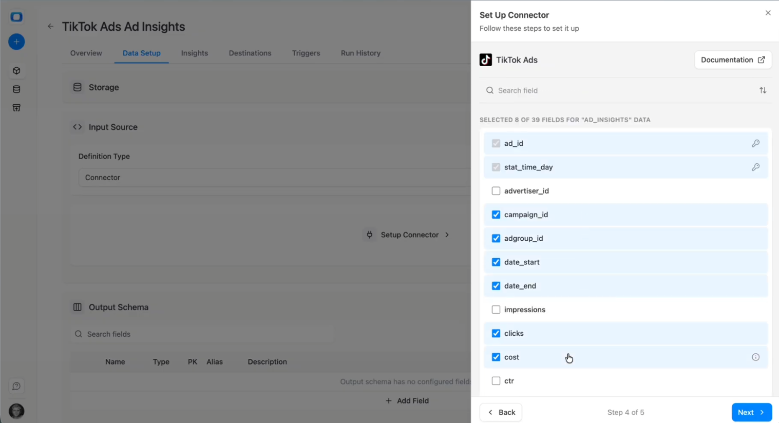 Field selection screen in OWOX Data Marts showing TikTok Ads metrics like campaign_id, adgroup_id, clicks, and cost, selected for ingestion. i-shadow