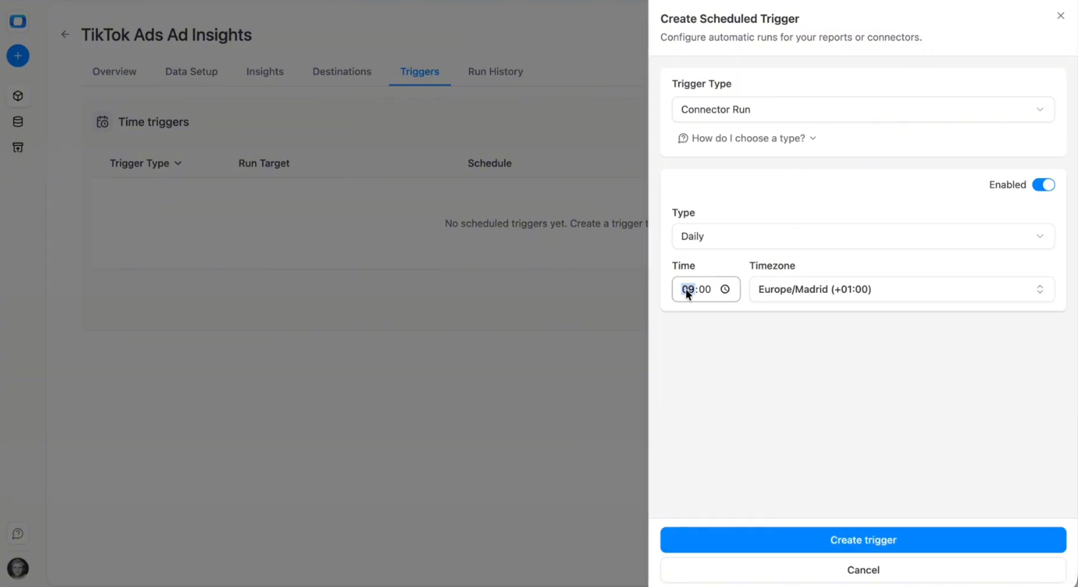 Trigger configuration screen in OWOX Data Marts showing scheduled connector run setup for TikTok Ads. i-shadow