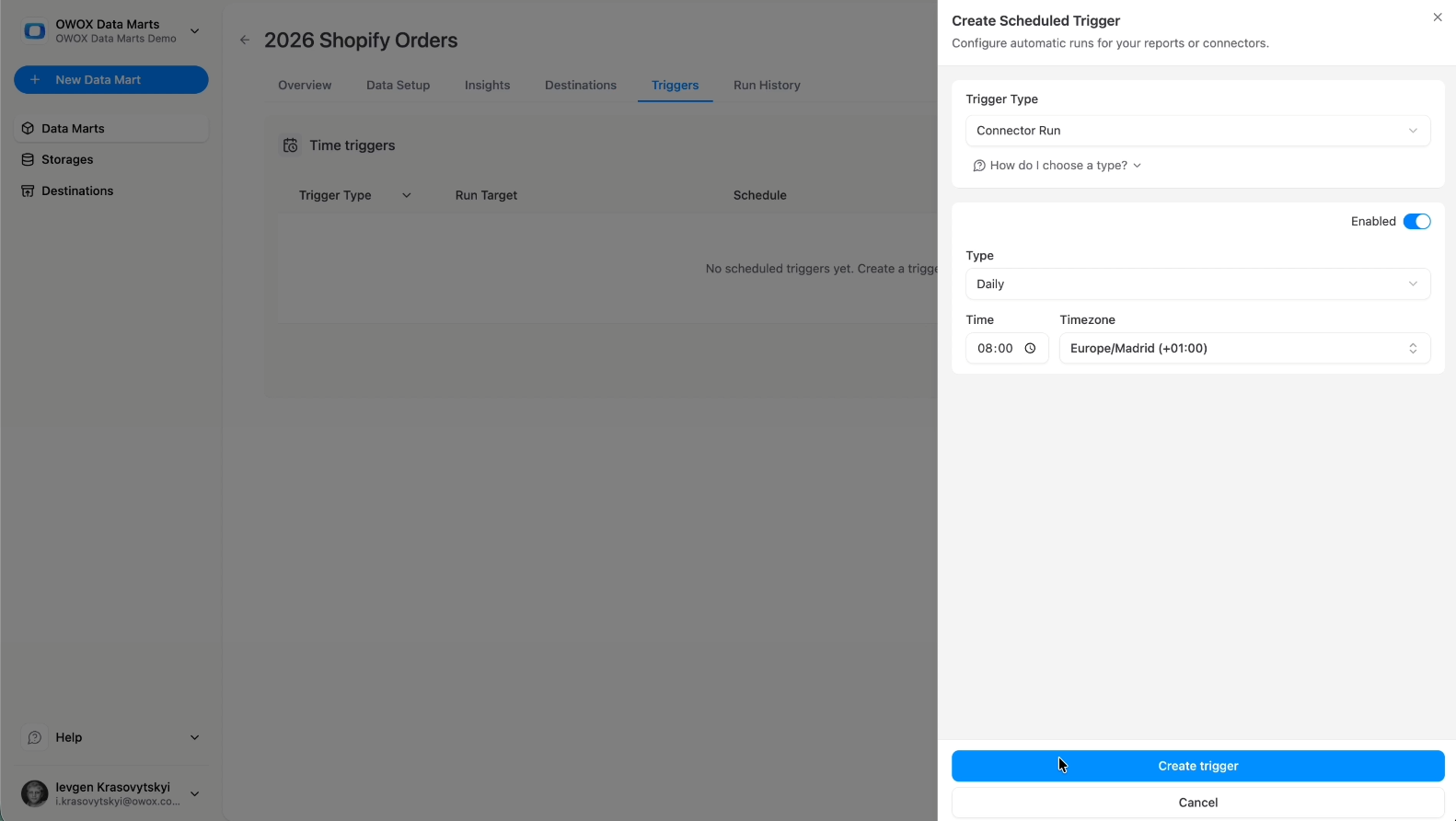 Scheduled trigger configuration in OWOX Data Marts showing Connector Run frequency and timezone setup for automated Shopify data refresh in Snowflake. i-radius i-shadow