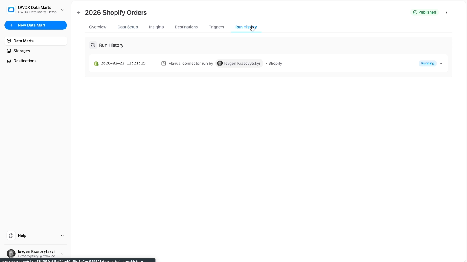 Run History tab in OWOX Data Marts showing execution status, row counts, timestamps, and detailed logs for a Shopify data mart run. i-shadow i-radius