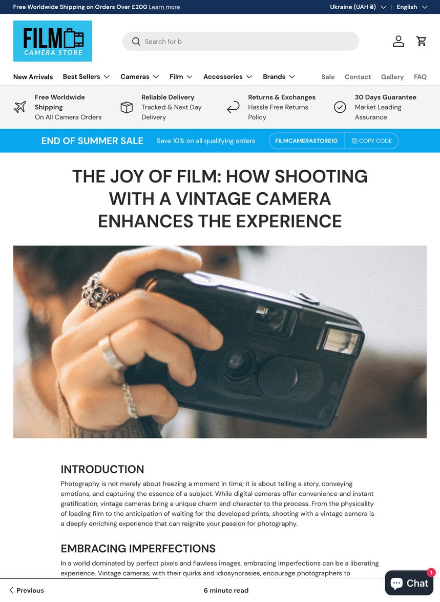 A website page discussing the experience of shooting with vintage cameras, featuring a close-up image of a person holding a film camera. i-shadow