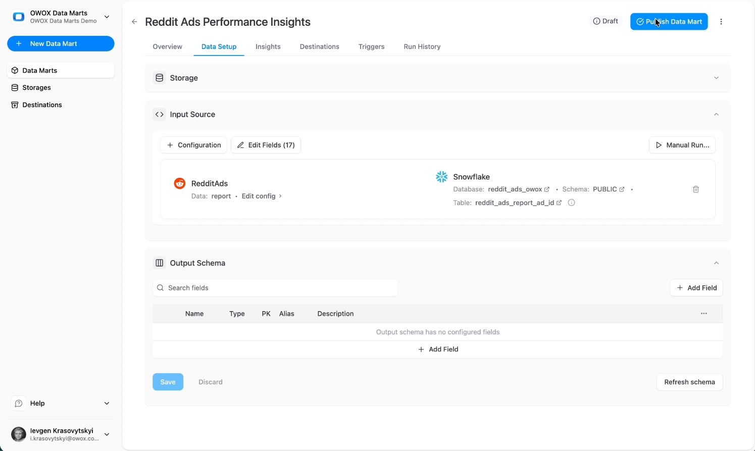 Snowflake destination configuration in OWOX Data Marts showing database, schema, and table setup for Reddit Ads data loading. i-shadow i-radius