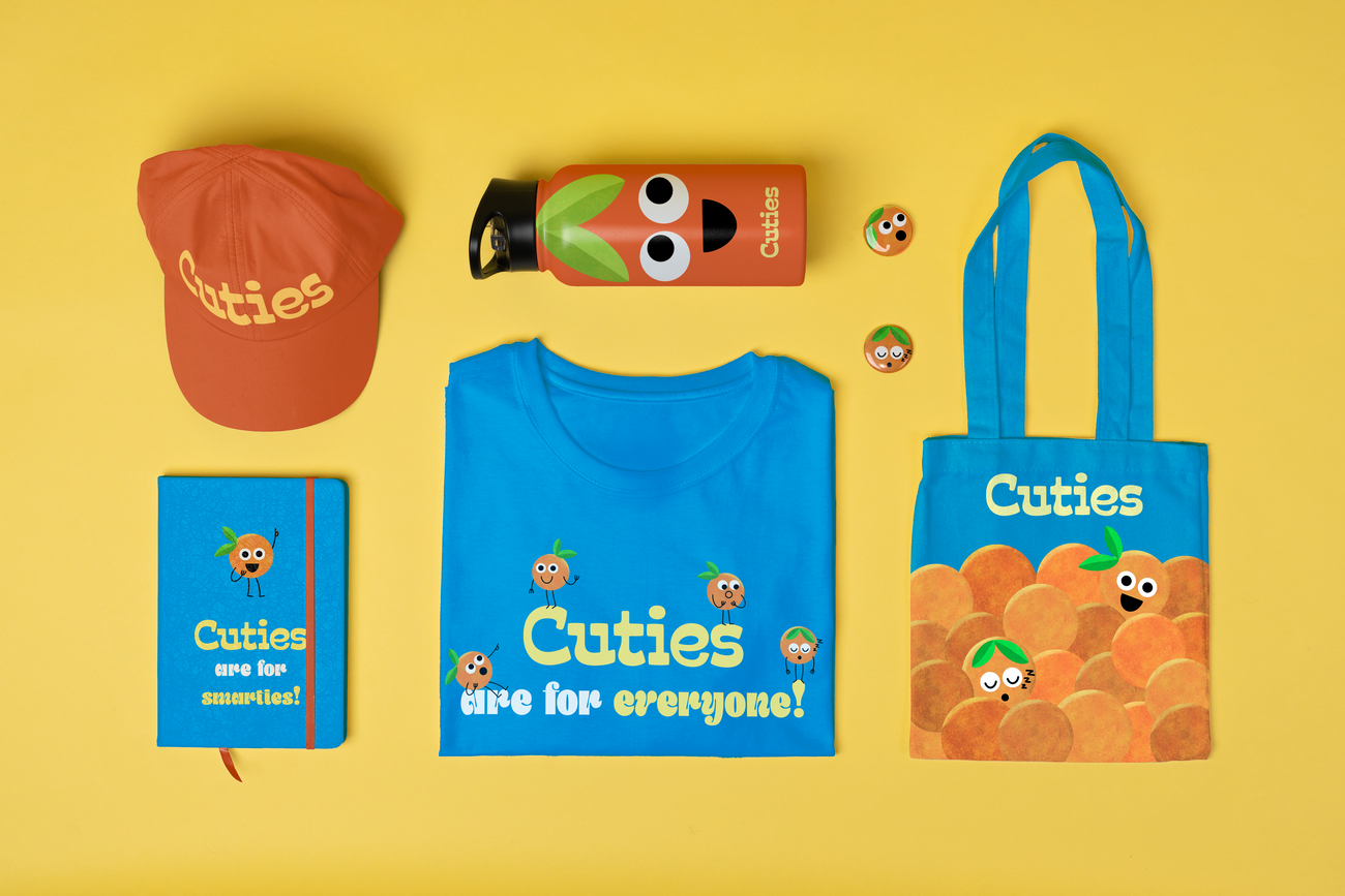 A layout of merch for Cuties with the updated branding
