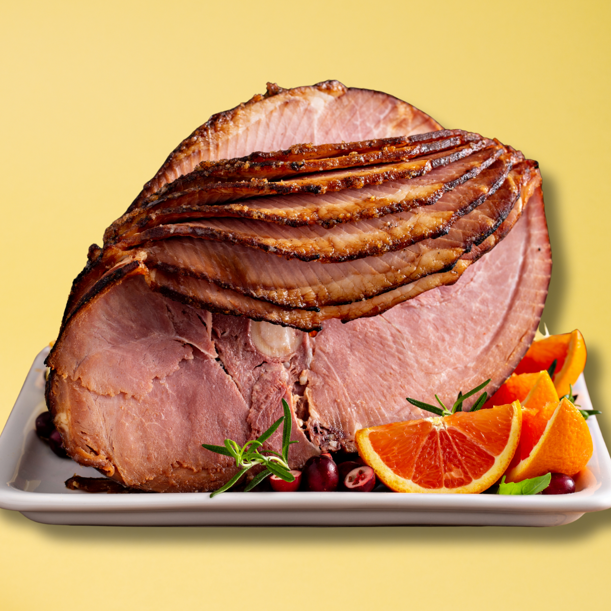 Tray of freshly made guacamole with chips and a cazo of guacamole in the background