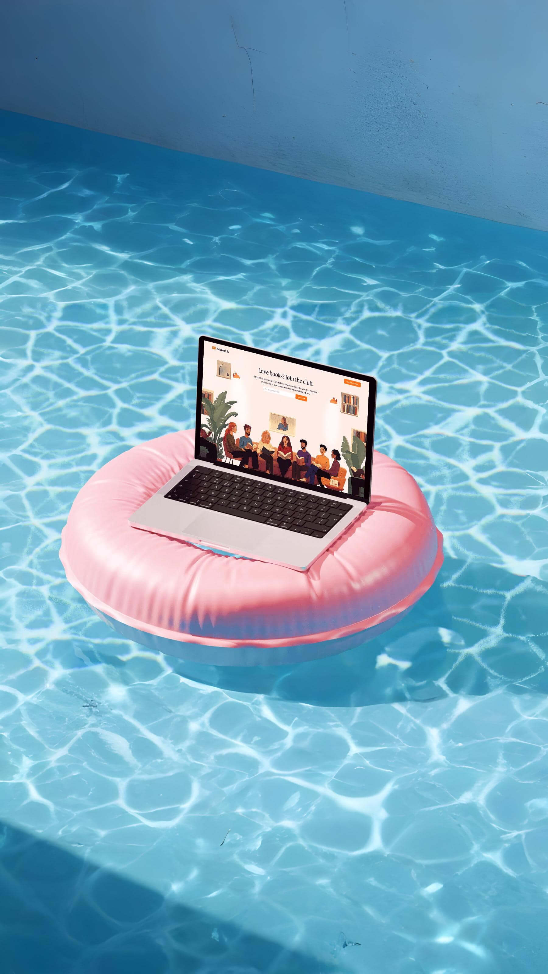 MacBook displaying BookclubVR website on a pink pool float in clear blue water, highlighting immersive web design presentation