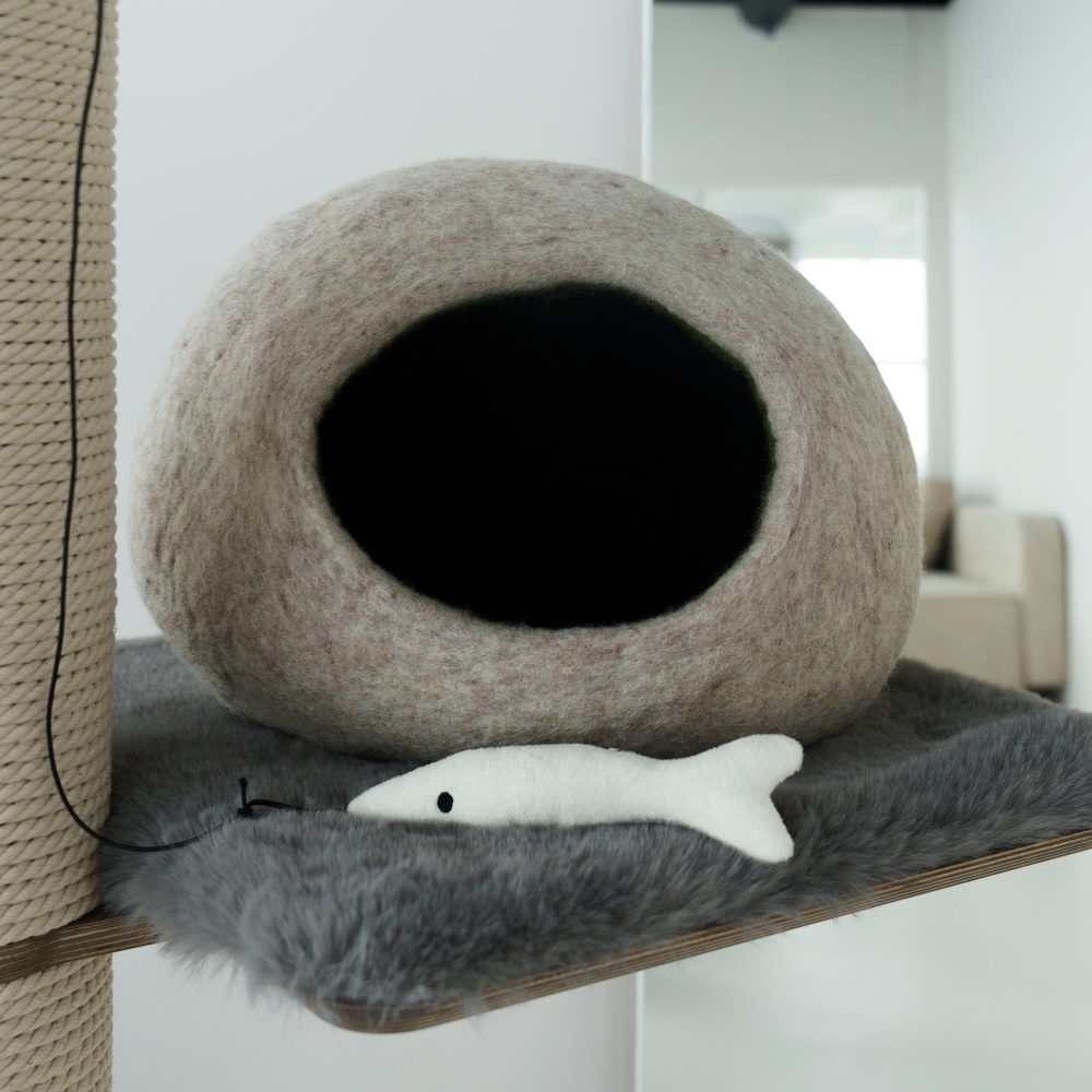 A Kikska felted wool cat cave