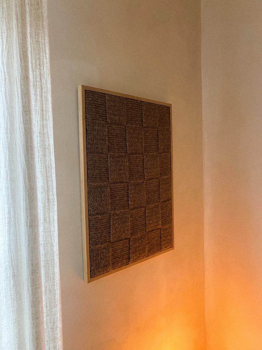 textile wall art in brown