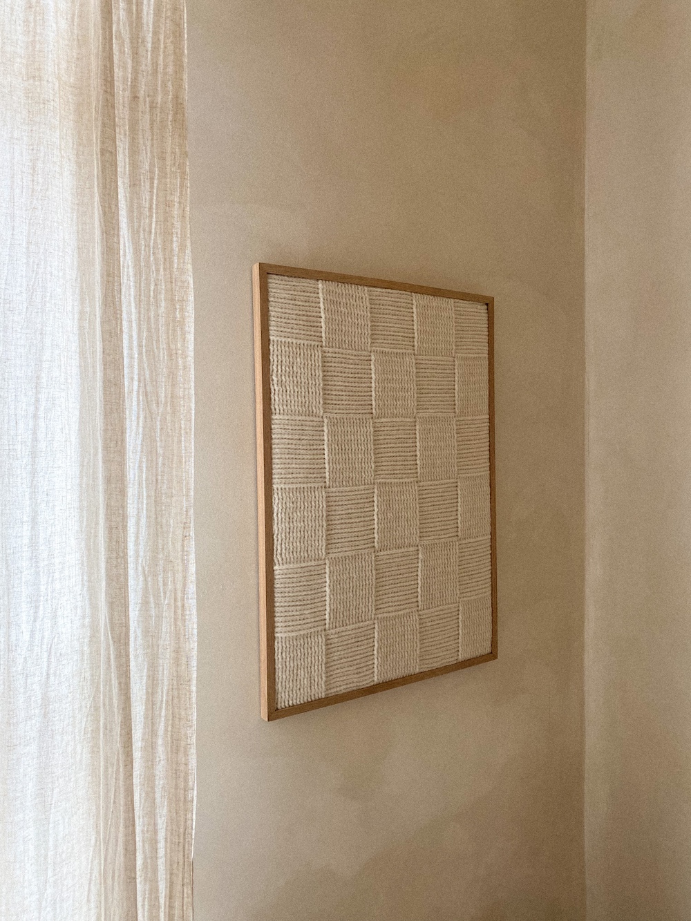 textile wall art in off white