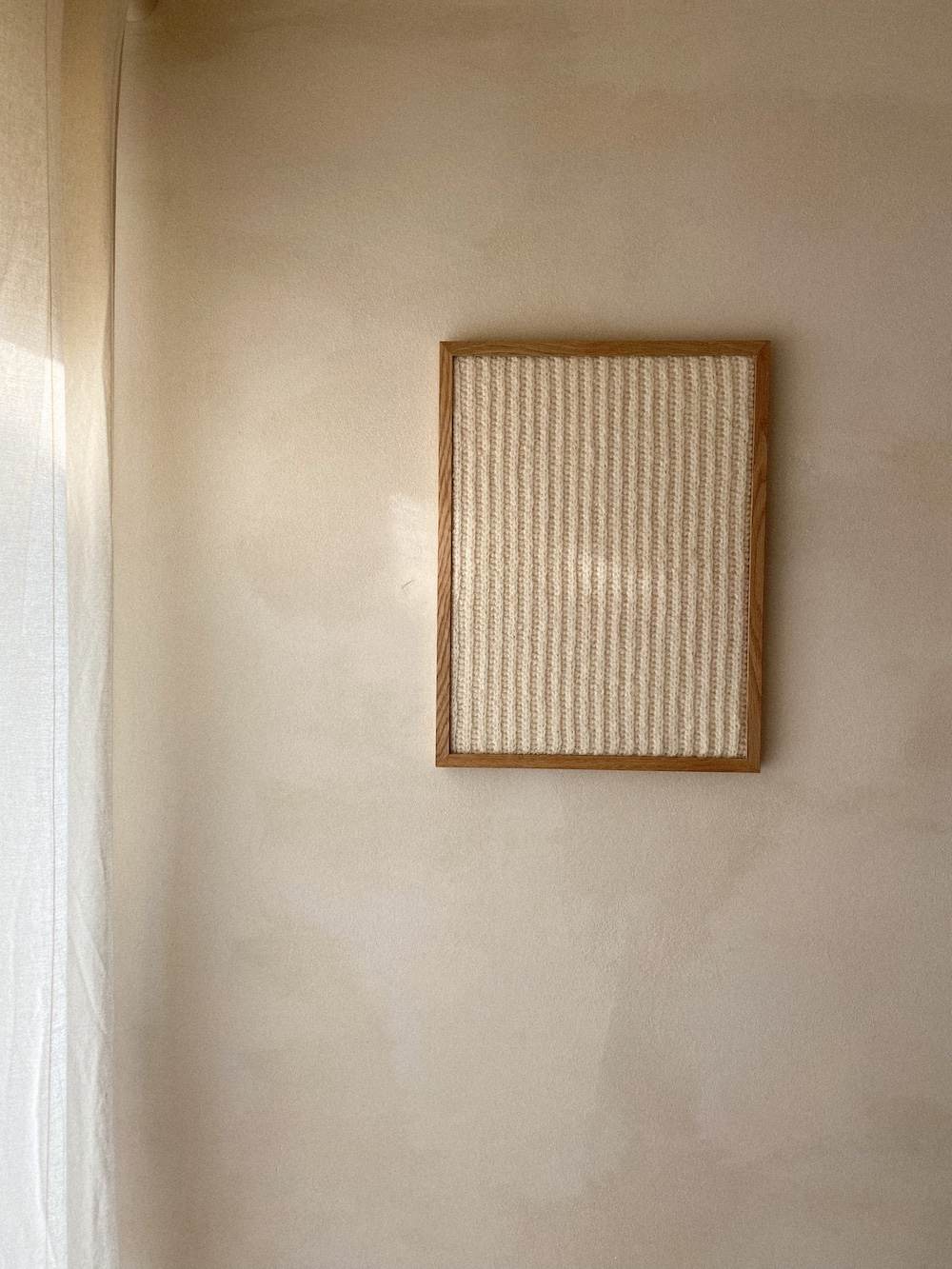 textile wall art in off white
