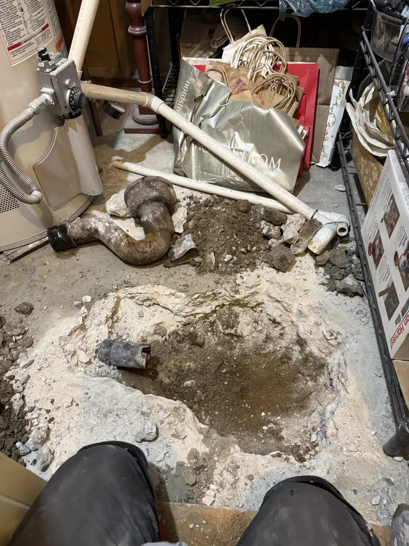 cracked underground clay sewer pipe showing winter freeze-thaw damage cracked underground clay sewer pipe showing winter freeze-thaw damage