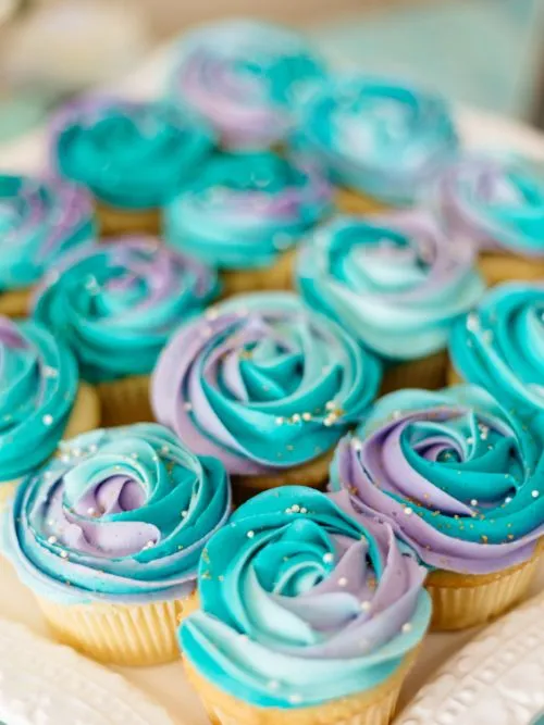 Close up filming of cupcakes at a baby shower event