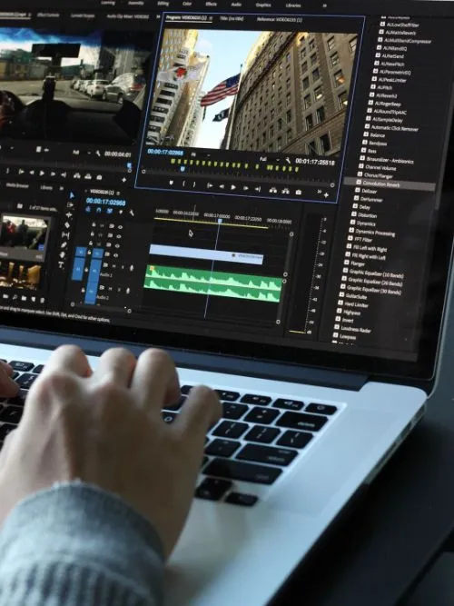 Editors computer showing video editing software being used on a home movie edit