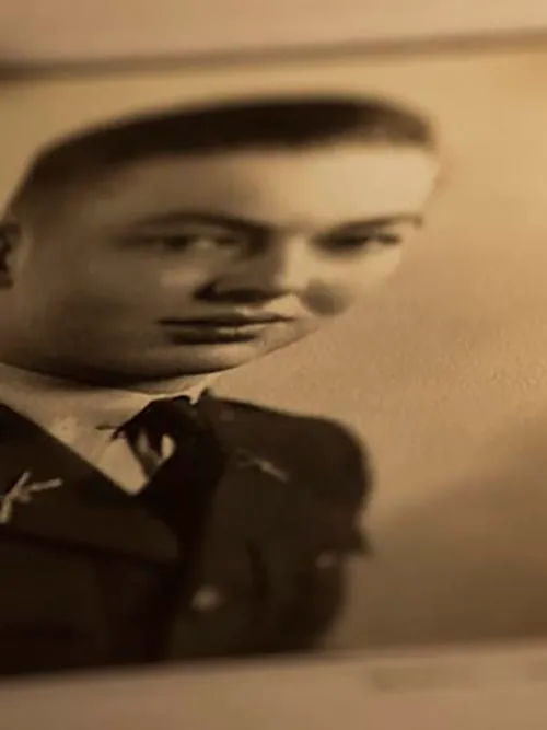 Old sepia photo of a man in military uniform