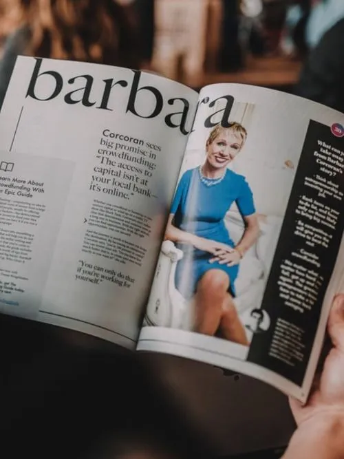 Press photograph in a magazine publicising the success of a crowdfunding project