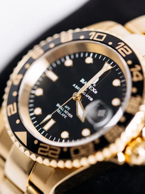 A men's gold Rolex watch being featured in a luxury product video
