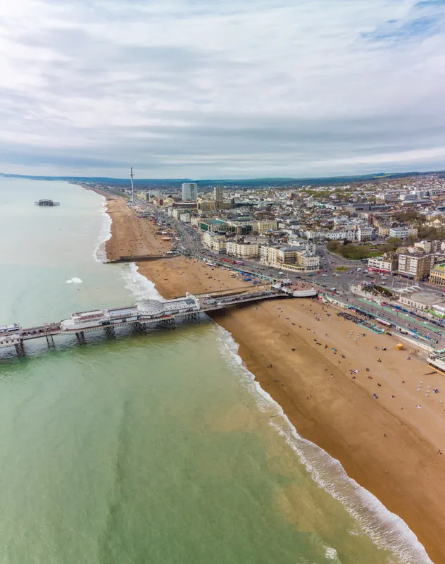 Aerial photograph of Brighton shot from a drone showing the beach and town