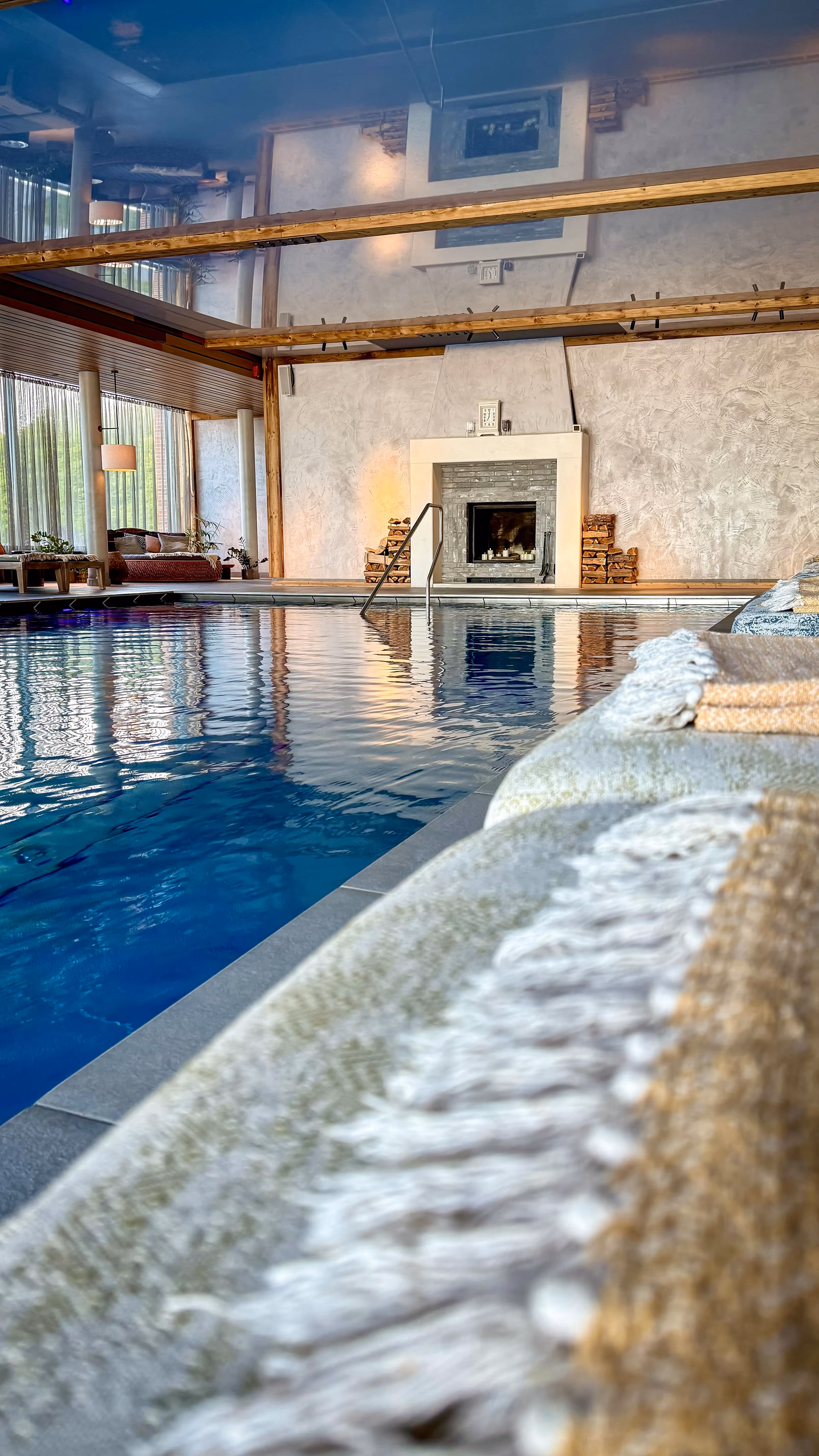 Indoor pool with daybeds