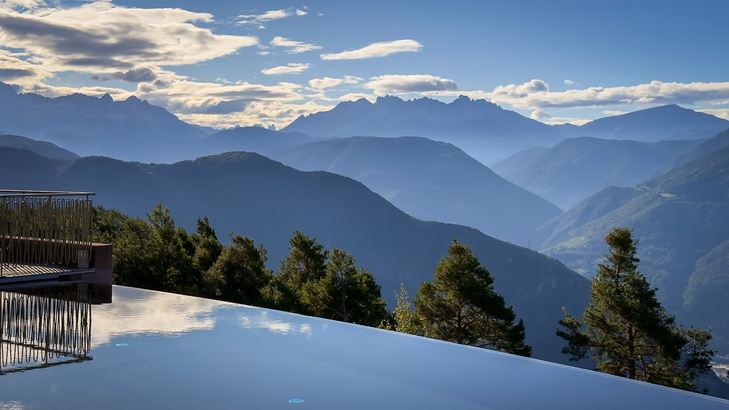 Infinity pool overlooking the mountains at Hotel Belvedere