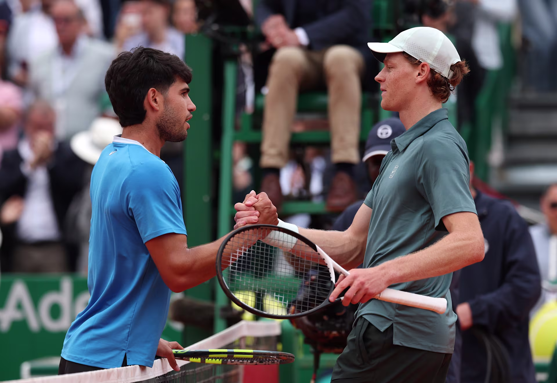 Jannik Sinner and Carlos Alcaraz at the net after the Monte Carlo Masters final in Monte Carlo