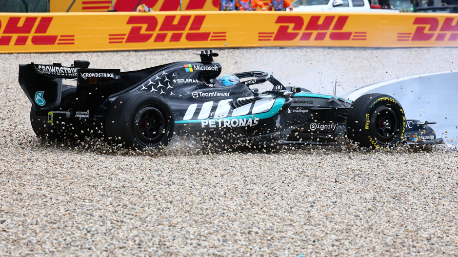 Lewis Hamilton and George Russell colliding at the 2026 Belgian Grand Prix in Spa