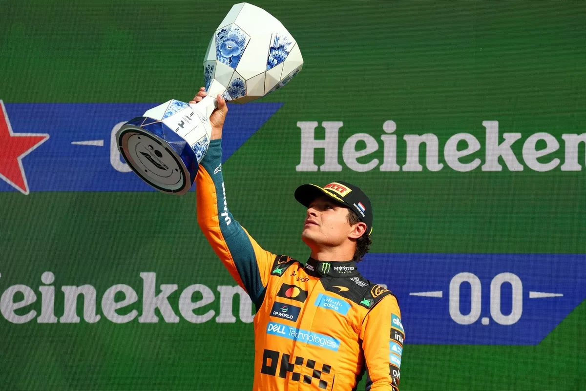 Formula 1 driver Lando Norris celebrating victory for McLaren at the Dutch Grand Prix in Zandvoort