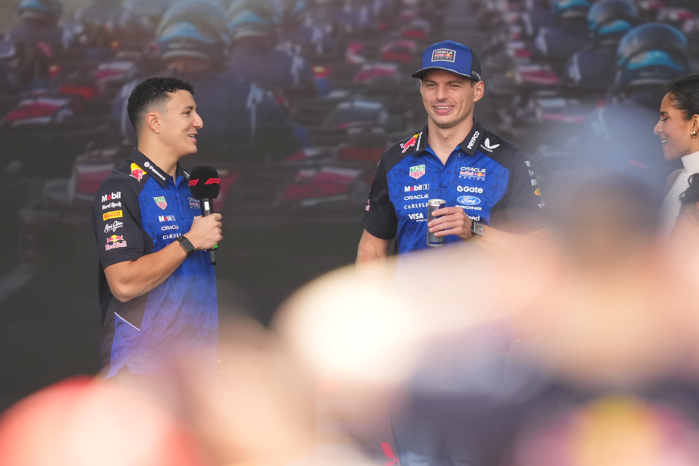 Formula 1 drivers Max Verstappen and Isack Hadjar at the Baku City Circuit fan zone