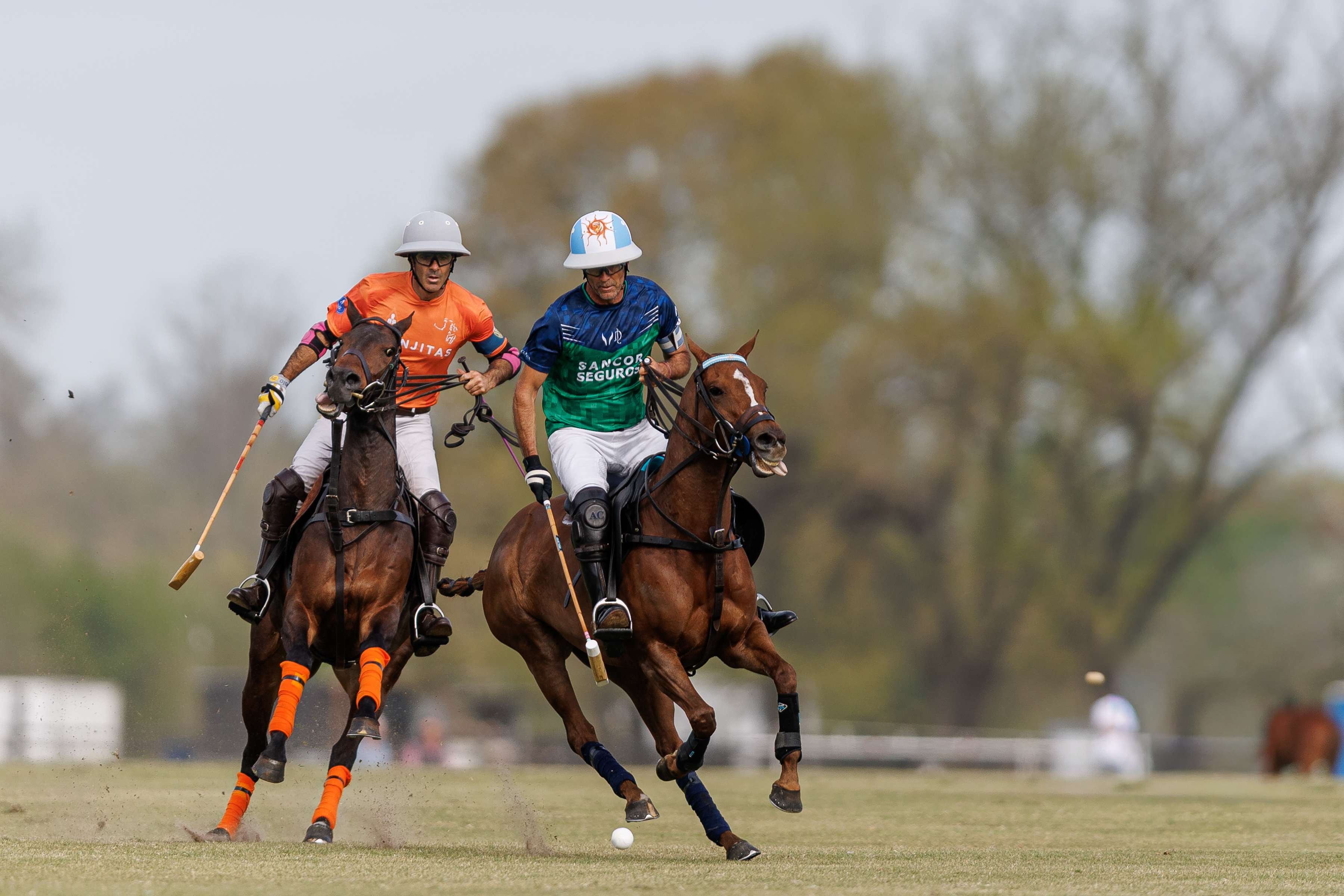 Juan Martín Nero of Las Monjitas and Adolfo Cambiaso of La Natividad La Dolfina at the Hurlingham Open polo semi-final