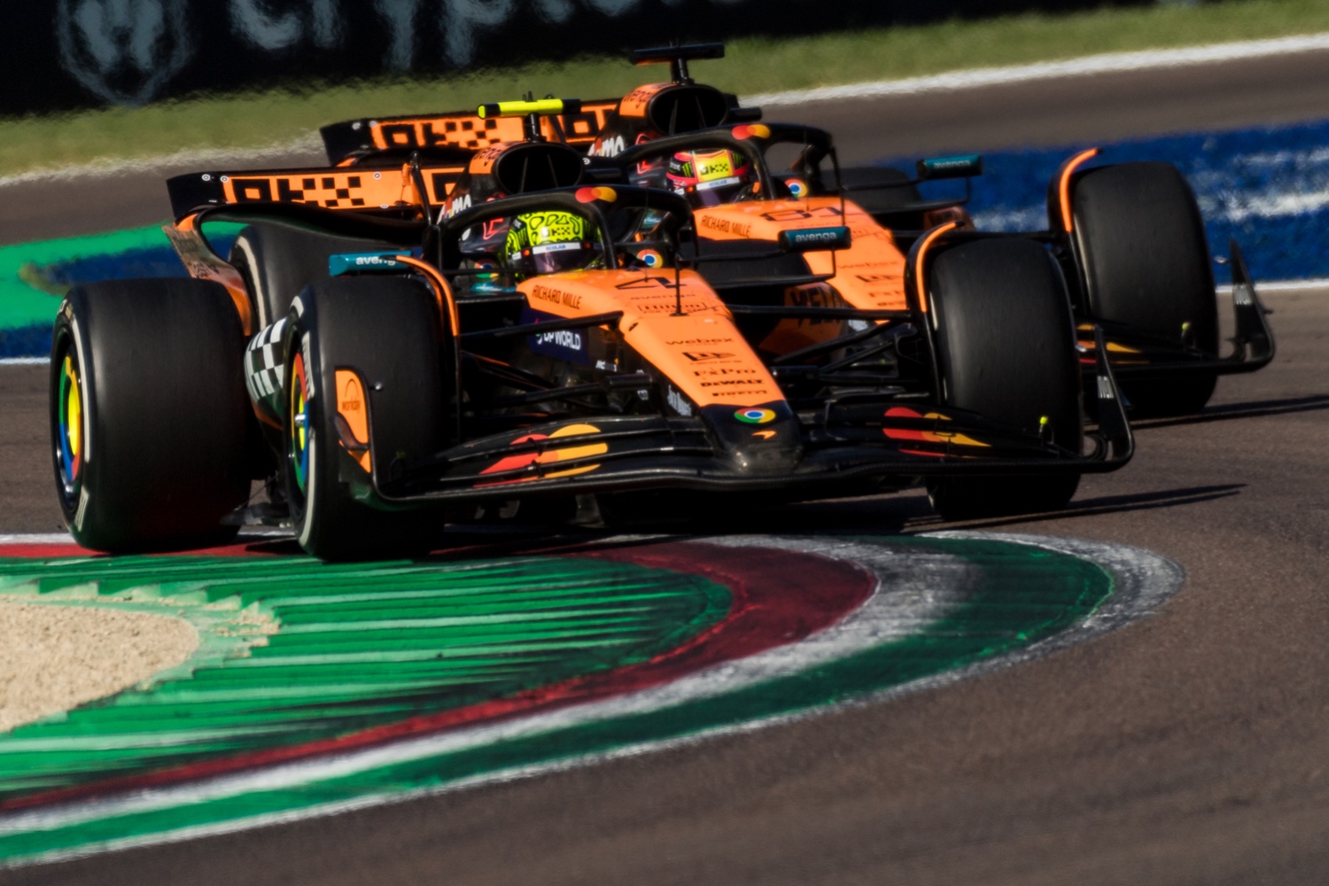 McLaren Formula 1 cars leading free practice at the 2025 Emilia-Romagna Grand Prix in Imola